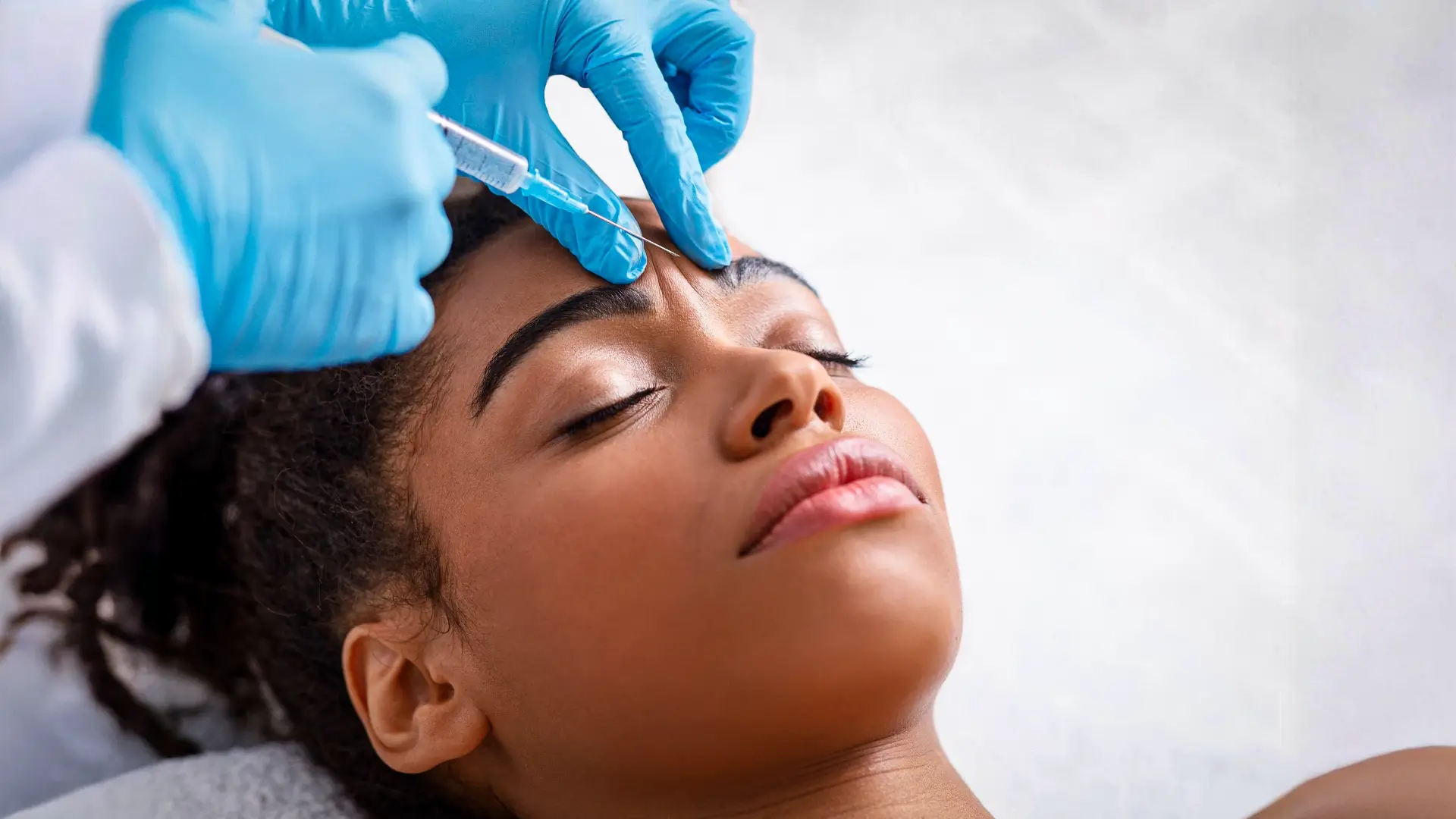 Botox wrinkle-relaxing injection applied to forehead – Cosmetic treatment in New Westminster, BC