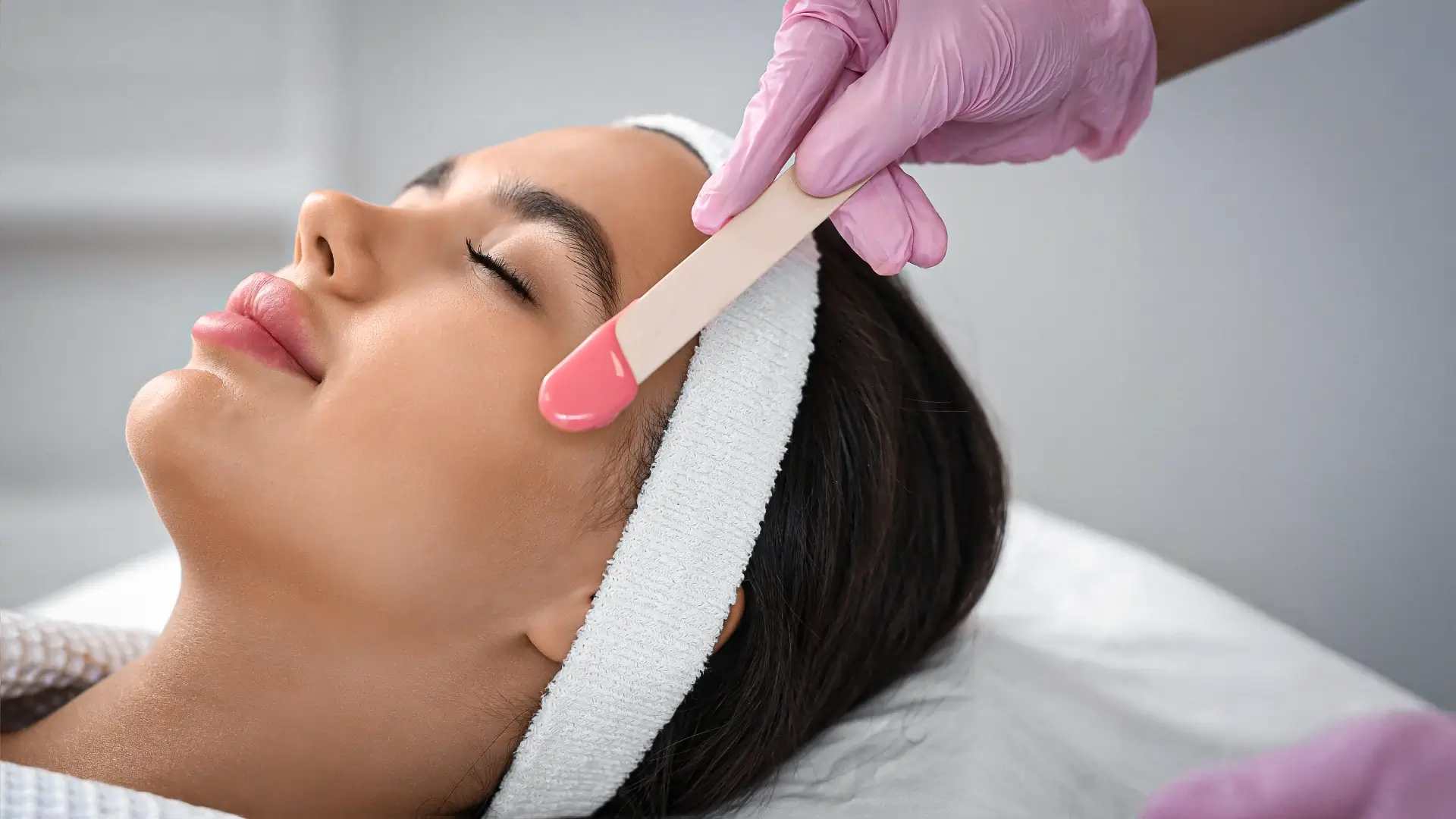 Facial waxing application for precise hair removal – Beauty & Wellness clinic in New Westminster, BC